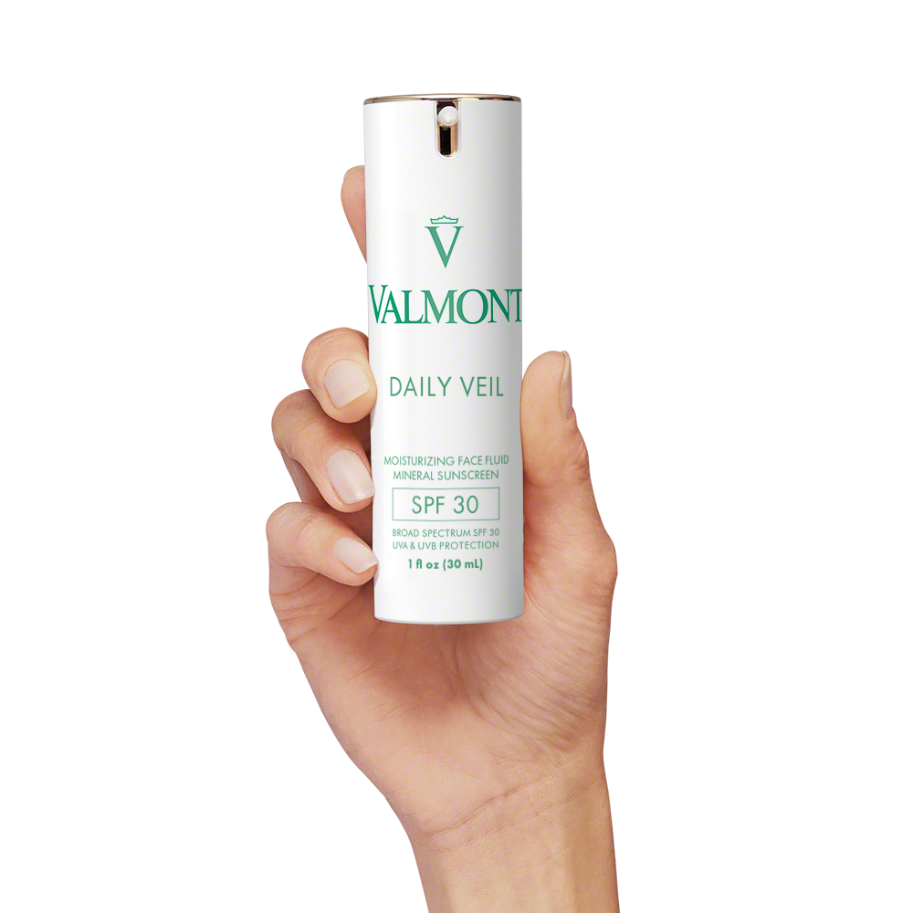 Valmont Daily Veil SPF 30 in hand